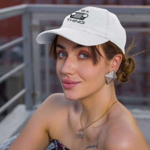 Its a CJ grille thing - baseball cap - female