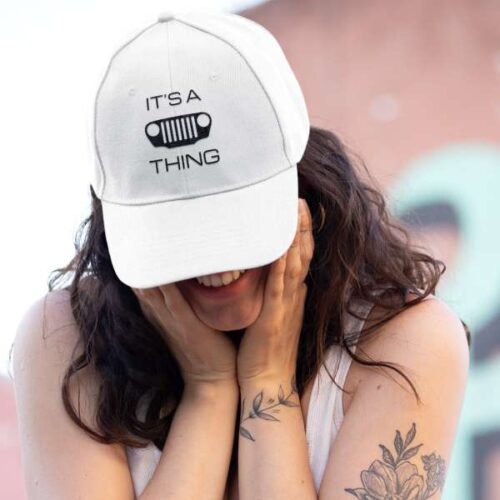 Its a TJ grille thing - baseball cap - female